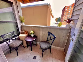 Spacious 2BR Suite with Balcony | Modern Comfort - Image 4