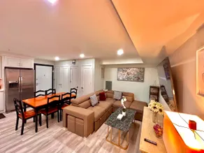 Spacious 2BR Suite with Balcony | Modern Comfort - Image 2