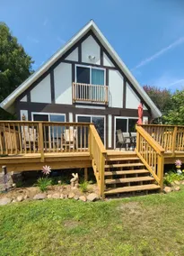 Family Friendly Lakefront Whimsical Cottage with Pontoon Boat in Sister Lakes MI - Image 2