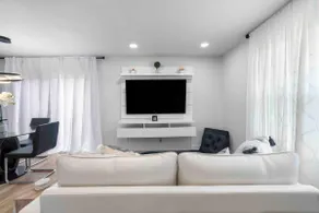 Elegant Modern 2BR Escape with Secure Garage - Image 2