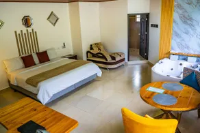 King Suite with Private Jacuzzi / Sunset - Image 2