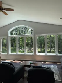 Large home with hot tub in serene wooded setting - Image 3