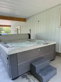 Large home with hot tub in serene wooded setting - Image 4