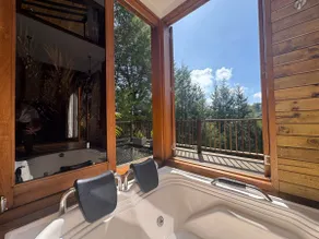 Cabin with Jacuzzi 8 min from JMC Airport - Image 3