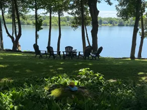 Lake front home on private, tree-lined drive. - Image 4