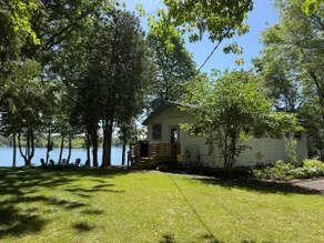 Lake front home on private, tree-lined drive. - Image 2