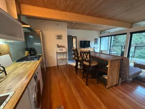 Rick’s gorgeous forest retreat. - Image 2