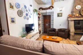 A townhouse with a picnic area and fireplace. - Image 2