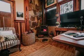 Alpine Lodge Built Around a Ski Lift Tower - Image 5