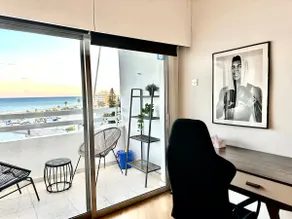 1BR Seafront Apt with community pool - Image 3