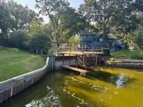 Lakefront House with Dock and Porch - Image 4