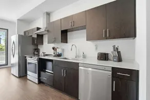 Elevated Green-Build Condo Escape with Pool Access - Image 5
