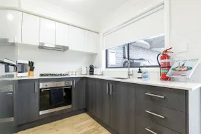Modern and stylish 2BR unit with private yard. - Image 4
