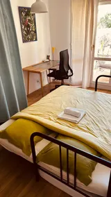 Quiet 2-bedroom apartment with private garden and parking - Image 4