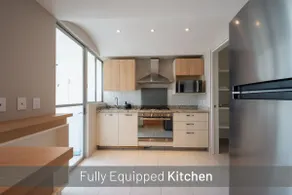 Capitalia | Urban Retreat: Furnished Oasis - Image 4