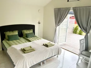 Tiny cosy guesthouse in a calm residential area - Image 2