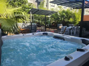 Vibin' Fun House 400meters (5 min walk) to D'Albora Marinas.\nOutdoor Spa - Image 2