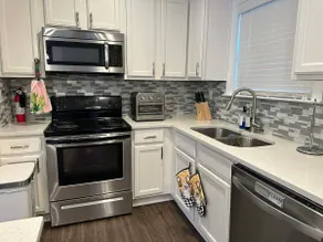 Cozy Duluth Retreat-6 Beds • 6TVs • Prime Location - Image 4