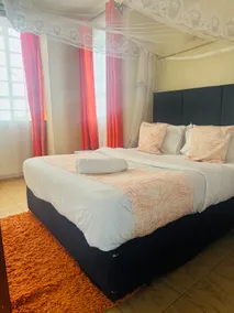 Jolly 1br with AC, backup gen, Netflix, Balcony - Image 2