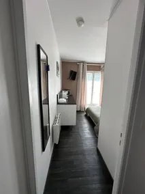 Bedroom with bathroom - Image 5