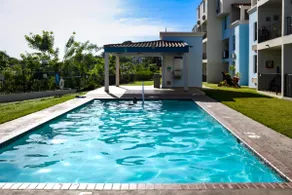 Beach side Condo with Pool - Image 2