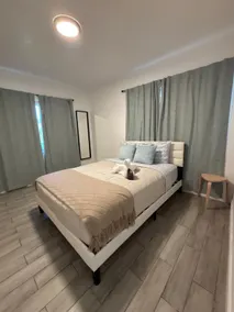 2BR with Backyard Near Airport & Design District - Image 5