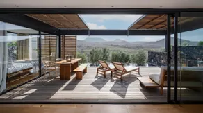 Wake up to nature in this modern glass house - Image 2
