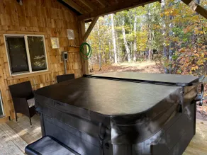 Two bedroom cabin with hot tub and fireplace. - Image 4