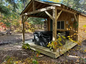 Two bedroom cabin with hot tub and fireplace. - Image 2