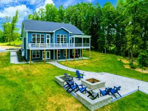 250’ of Lakefront with Boat House & Private Beach - Image 4