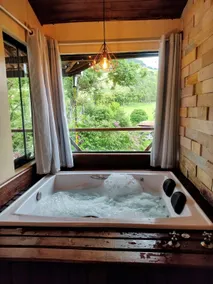 Chalet for couple with a hydro-massage tub, fireplace and kitchen. - Image 2