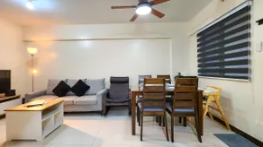 Modern 2BR Condo | Fully Airconditioned w/ Parking - Image 3
