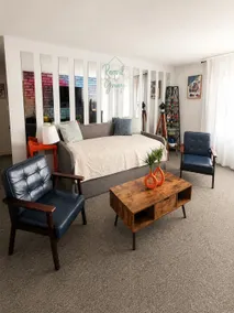 90s Condo| King Bed | 65” Smart TV | Arcade Game - Image 2