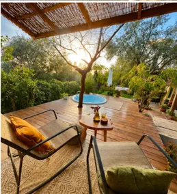 Somewhere in Clil, the vineyard cabin A huge bathtub on a wooden deck outside - Image 3