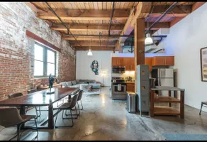 Arts District 1BR Loft•1400 SqFt w/ Bookshelf Door - Image 2