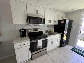 Poolside studio home! A walk to the beach! - Image 4