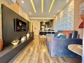 1-Bedroom Premium Batel · Sky · Air Conditioning and Pool - Image 4