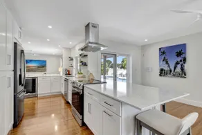796 | Waterfront | Sleeps 10 | Heated Pool |Tiki Hut |Fire Pit |by DelrayNightly - Image 4