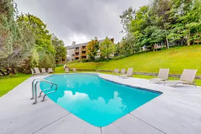 2BR ski-in/out condo with pool & mtn views - Image 2