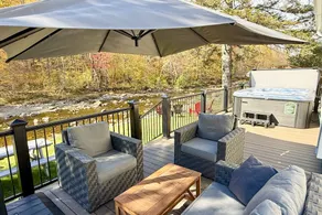 Inviting riverfront 3BR near skiing & golf - Image 2