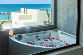 Beachfront Villa with Sunset Terrace BBQ & Jacuzzi - Image 5