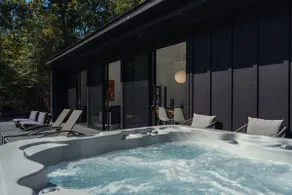Modern Woodland Getaway with Hot Tub and Fire Pit - Image 2