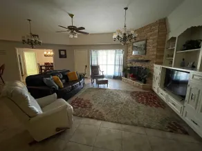Spacious Living Area Triplex Unit! - Image 2