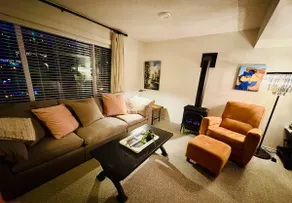 A Comfy Stay: Fireplace, EV Charging, & Workspace - Image 2