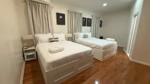 Spacious 3BR • Sleeps 12 • Near NYC Train + Parkin - Image 4