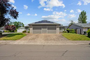 Inviting 2BR Half-Plex-Equipped Kitchen & Garage - Image 2