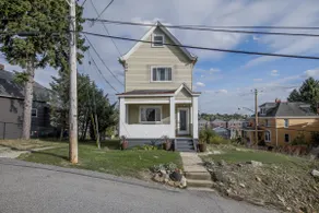 Hilltop Bungalow with city views! - Image 5
