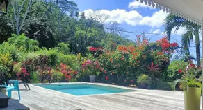 Peaceful haven with pool in a tropical garden - Image 2