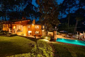 Residence with a swimming pool, paddle tennis court, and garden. - Image 4