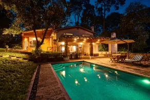 Residence with a swimming pool, paddle tennis court, and garden. - Image 2